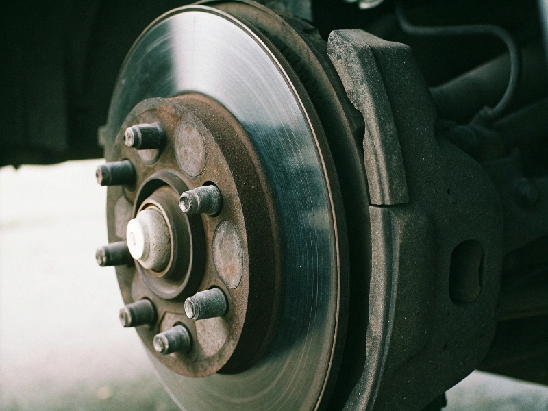 Brake disc and caliper inspection and repair close-up